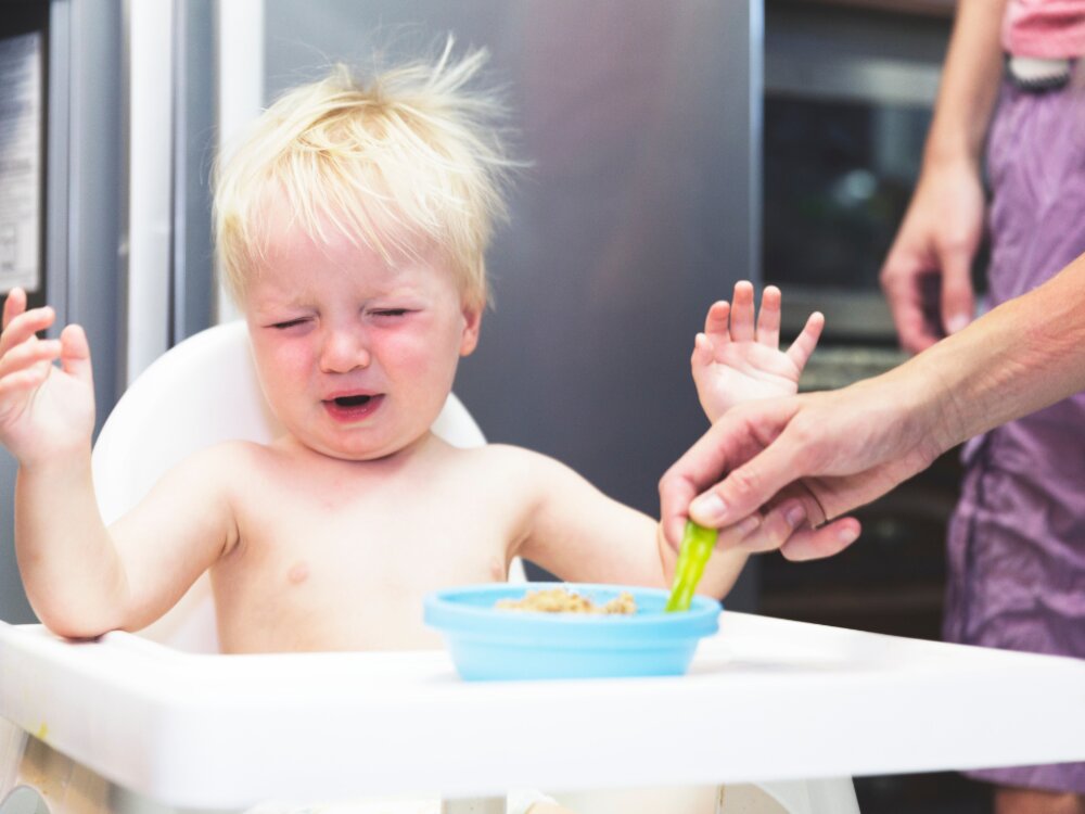 Kid crying at dinner