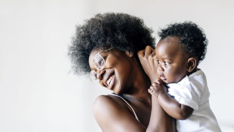 Woman holding her baby