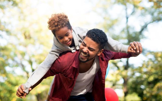Dad and son laughing