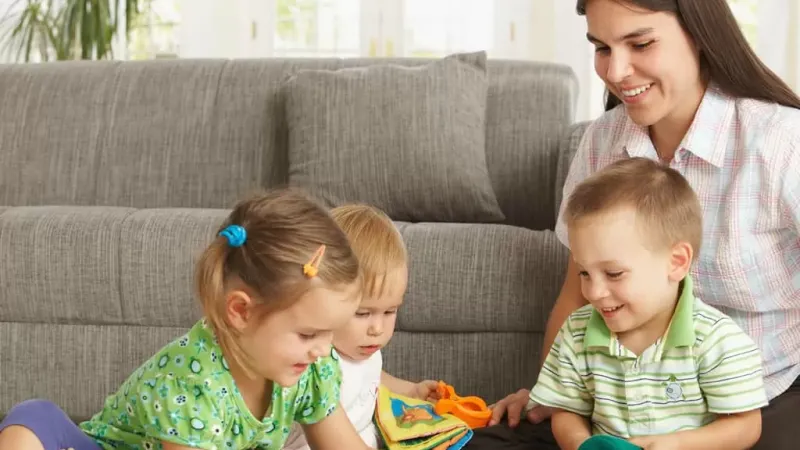 Mother playing with children