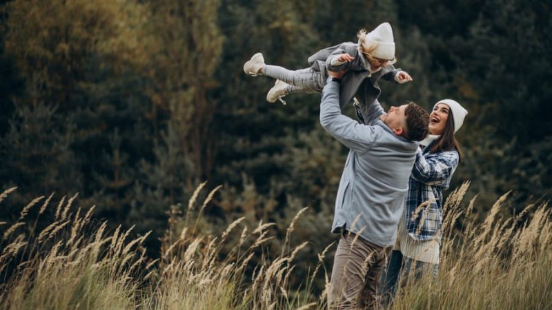 Dad laughing with his family