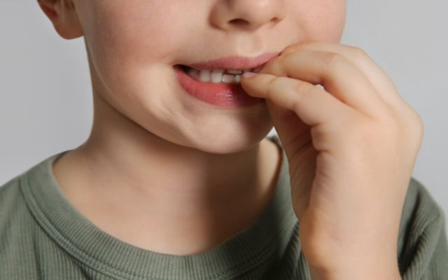 Nail biting child