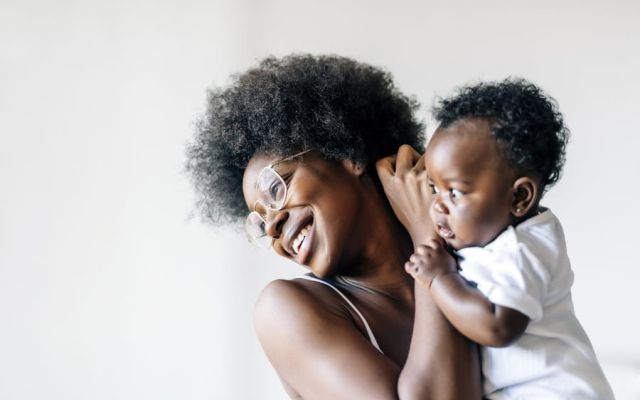 Woman holding her baby