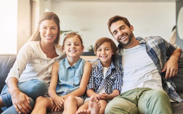 Happy family on sofa