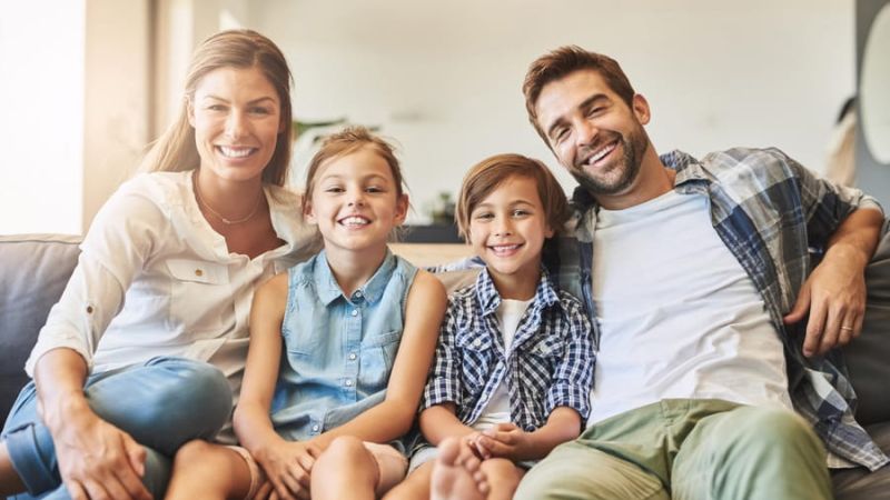 Happy family on sofa