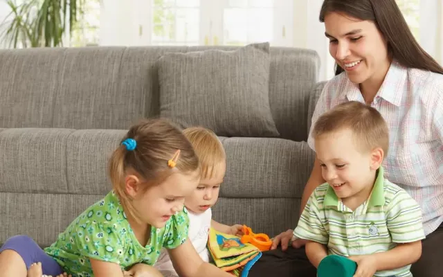 Mother playing with children