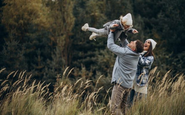 Dad laughing with his family