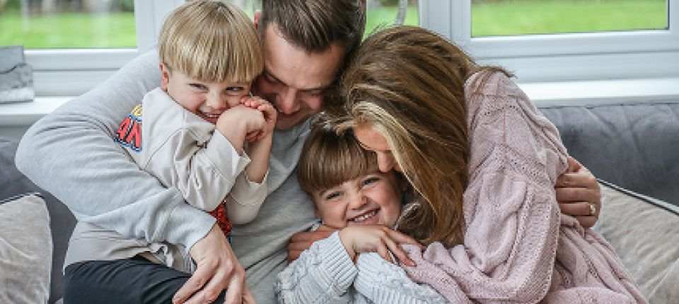 Happy family hugging