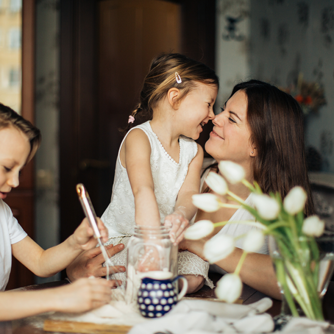 Mother baking with her son and daughter